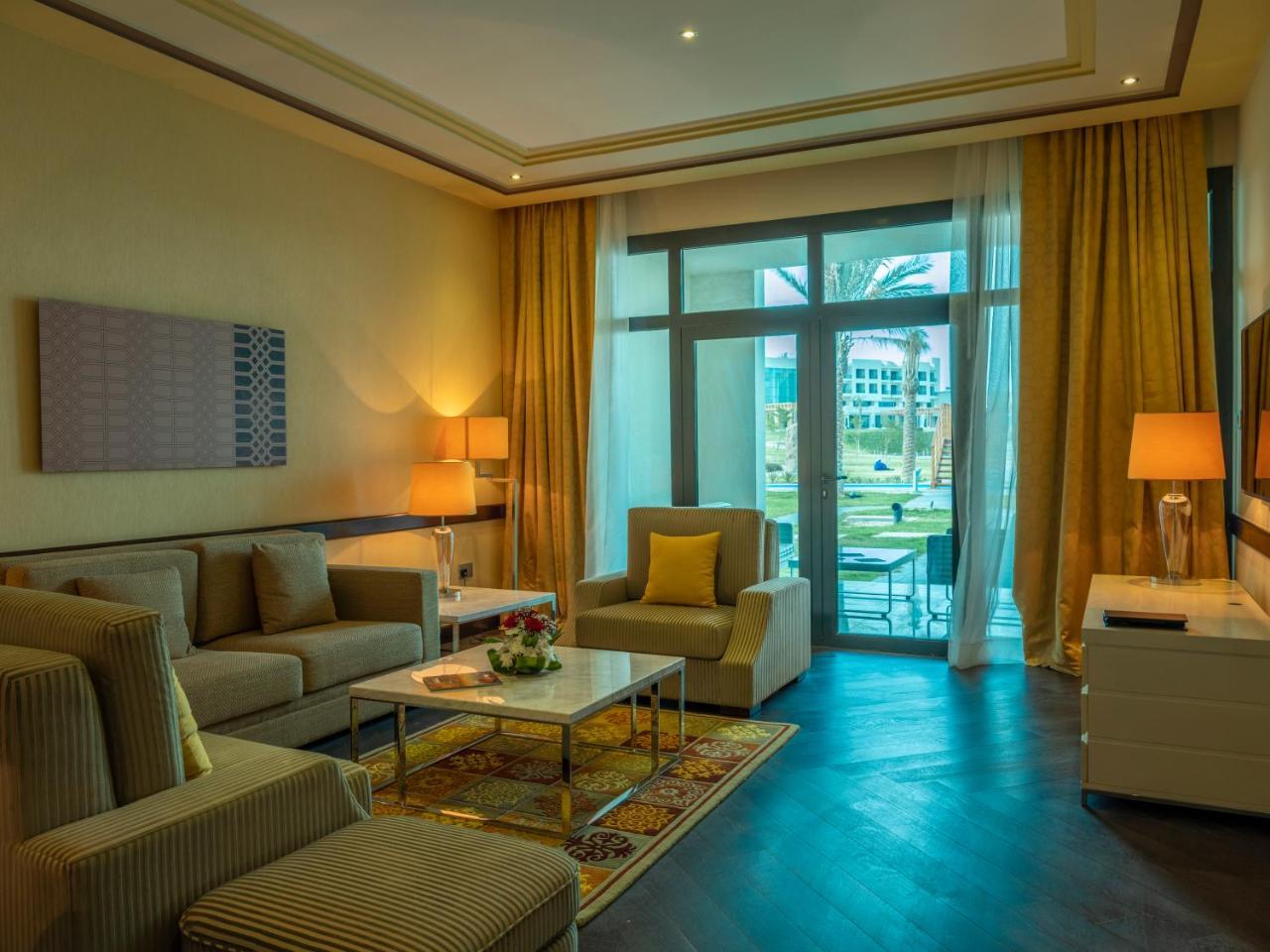 Retaj Salwa Resort & Spa Доха Екстер'єр фото A living room at the hotel