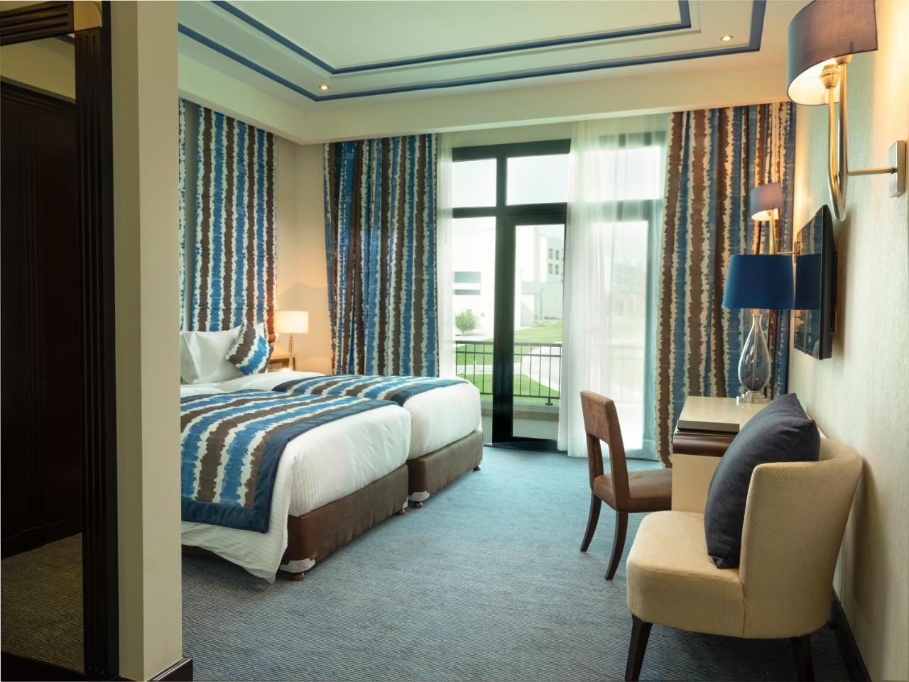 Retaj Salwa Resort & Spa Доха Екстер'єр фото A room at the hotel