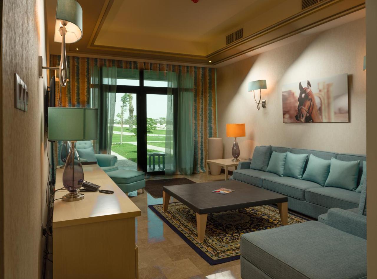 Retaj Salwa Resort & Spa Доха Екстер'єр фото A living room in a suite at the Ritz-Carlton, Dubai