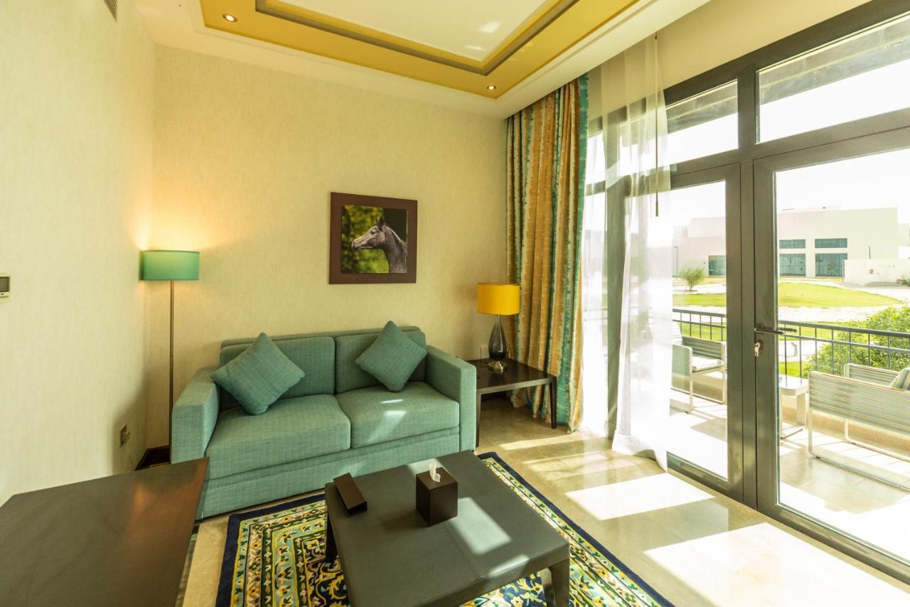 Retaj Salwa Resort & Spa Доха Екстер'єр фото A living room at the resort